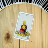 Four of Pentacles Tarot Card Meaning Love